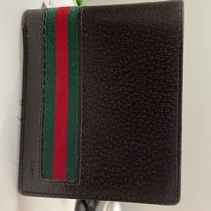 gucci wallet - signature band in very good condition.